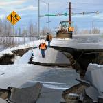 In this Nov. 30, 2018 photo, workers inspect a road that collapsed during an earthquake in Anchorage, Alaska. The Anchorage Museum will include social media reactions to the powerful earthquake that rocked Alaska for its archived historical record. The collection will include viral memes and other Facebook and Twitter responses to the Nov. 30 quake that struck 7 miles north of Anchorage, Alaska Public Media reported. (Mike Dinneen | Associated Press)