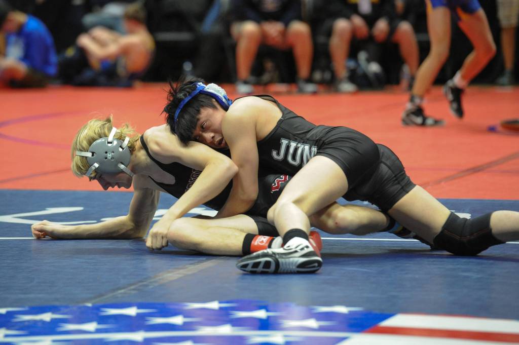 Thunder Mountain High School junior Ricky Ramirez wrestles Landon Hayes of Wasilla in the first round of the 152-pound bracket at the ASAA/First National Bank Alaska Division I State Wrestling Championships at the Alaska Airlines Center in Anchorage on Friday, Dec. 14, 2018. Ramirez was pinned at 4:28. (Michael Dinneen | For the Juneau Empire)