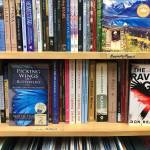 At River City Books, shoppers can easily find books written by local authors by perusing the local author shelf in the stores Alaska section, on Friday, Dec. 14, 2018, in Soldotna, Alaska. (Victoria Petersen | Peninsula Clarion)