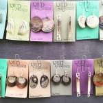 Some of artist Julienne Pachecos most recent earring designs, seen here as shown for sale at Juneaus 2018 Public Market, an annual event held each November. (Courtesy Photo | Julienne Pacheco)