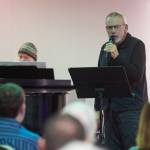Juneau Cabaret singer John Haywood sings for Juneau residents as he is accompanied by Luke Weld during the third annual Holiday Extravaganza at Centennial Hall on Wednesday, Dec. 19, 2018. (Michael Penn | Juneau Empire)