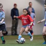 Striking Elves play against the St. Nick Hat Tricks at the Holiday Cup Soccer Tournament in the Well Fargo Dimond Park Field House on Friday, Dec. 22, 2017. The Holiday Cup is underway again now through New Years Eve with 400 players on 30 different teams. (Michael Penn | Juneau Empire File)