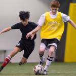 Stocking Stuffers play against the Jolly Saint Kicks at the Holiday Cup Soccer Tournament in the Dimond Park Field House on Friday, Dec. 22, 2017. The Holiday Cup is underway again now through New Years Eve with 400 players on 30 different teams. (Michael Penn | Juneau Empire File)