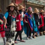 Members of the Woosh ji .een Dance Group perform during an unveiling ceremony for three bronze house posts in front of the Walter Soboleff Center by Sealaska Heritage Institute on Sunday, Aug. 26, 2018. (Michael Penn | Juneau Empire)