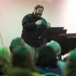 Juneau Cabaret singer Mike Gamble sings for Juneau residents during the third annual Holiday Extravaganza at Centennial Hall on Wednesday, Dec. 19, 2018. (Michael Penn | Juneau Empire)