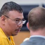 Thomas Jack, 42, speaks with his defense attorney Richard Payne during his sentencing in Juneau Superior Court for sexually abusing an 11-year-old girl placed in his and his wifes care in 2009. (Michael Penn | Juneau Empire)