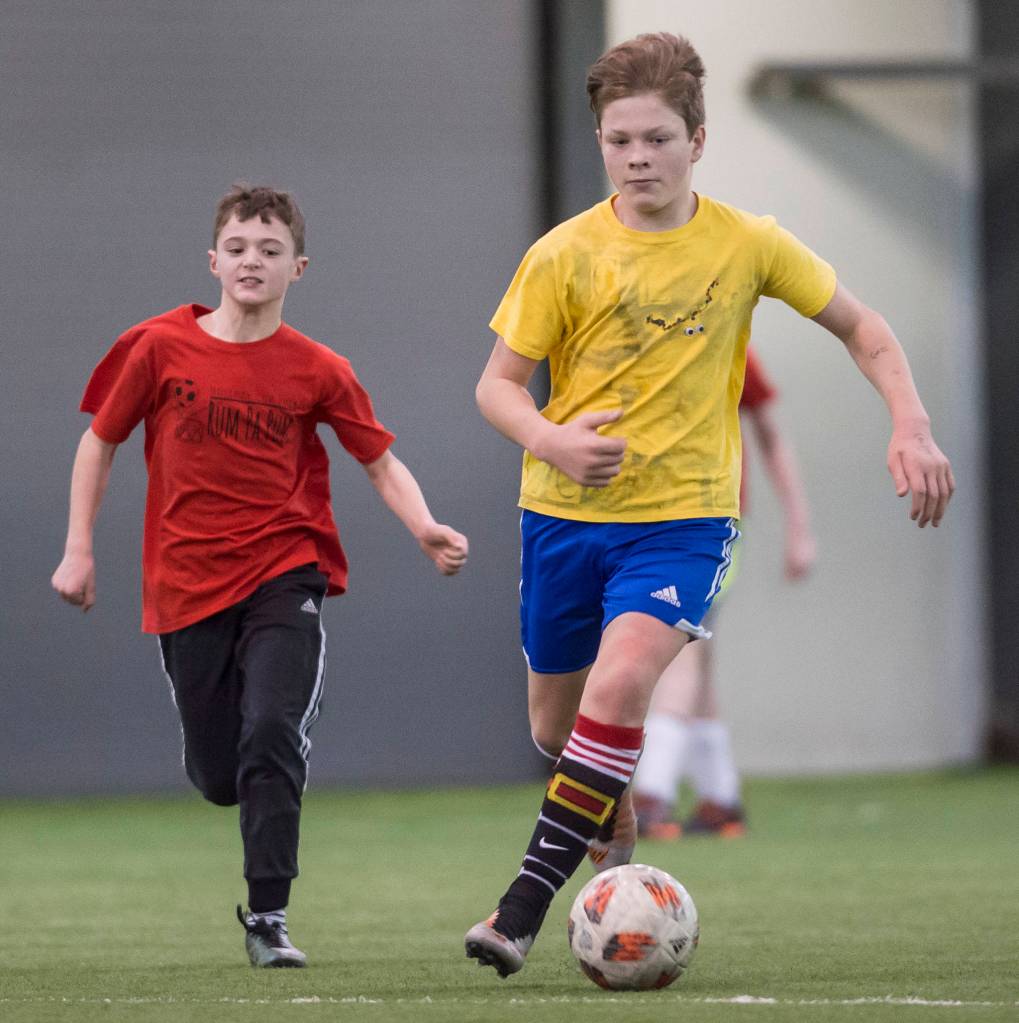 IceKickles play against the Rum Pa Pum at the annual Holiday Cup Soccer Tournament at the Wells Fargo Dimond Park Field House on Wednesday, Dec. 26, 2018. (Michael Penn | Juneau Empire)