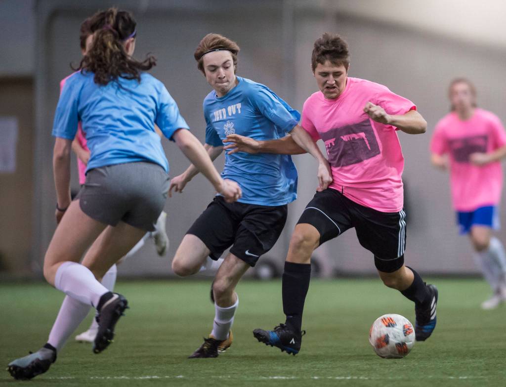 Iced Out plays against Pit Vipers at the annual Holiday Cup Soccer Tournament at the Wells Fargo Dimond Park Field House on Wednesday, Dec. 26, 2018. (Michael Penn | Juneau Empire)