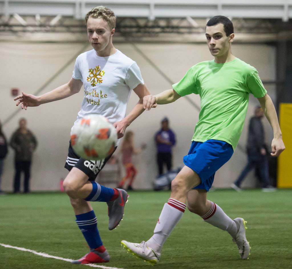 Snowflake United plays against Missile Toes at the annual Holiday Cup Soccer Tournament at the Wells Fargo Dimond Park Field House on Wednesday, Dec. 26, 2018. (Michael Penn | Juneau Empire)
