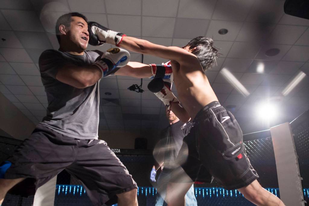 Joe Smith takes on Richard Jim at the Beatdown #33 at the Elizabeth Peratrovich Hall on Friday, Dec. 28, 2018. Smith won the match. (Michael Penn | Juneau Empire)