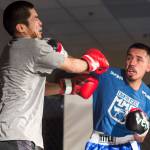 Seth Elisoff, blue shirt, takes on Darrel Whisenant at the Beatdown #33 at the Elizabeth Peratrovich Hall on Friday, Dec. 28, 2018. Elisoff won the match. (Michael Penn | Juneau Empire)