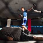 Seth Elisoff, center, celebrates his knockdown of Darrel Whisenant at referee Mike Shipman steps in during Beatdown #33 at the Elizabeth Peratrovich Hall on Friday, Dec. 28, 2018. Elisoff won the match. (Michael Penn | Juneau Empire)