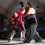 Michael Pitaro, red shirt, takes on James Roberts at the Beatdown #33 at the Elizabeth Peratrovich Hall on Friday, Dec. 28, 2018. Pitaro won the match. (Michael Penn | Juneau Empire)
