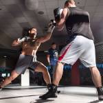 Brian Lauth, dark shirt, takes on Fritz Ropati in the main event at the Beatdown #33 at the Elizabeth Peratrovich Hall on Friday, Dec. 28, 2018. Lauth won the match. (Michael Penn | Juneau Empire)