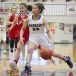 Barrows Jordan Ahgeak, right, drives past Sitkas Tawny Smith at the Princess Cruises Capital City Classic at Juneau-Douglas High School on Saturday, Dec. 29, 2018. Barrow won 58-50. (Nolin Ainsworth | Juneau Empire)
