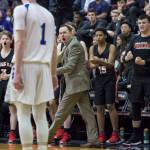 Juneau-Douglas Coach Robert Casperson, center, and players celebrate a basket against Maine-Endwell at the Princess Cruises Capital City Classic at Juneau-Douglas High School on Saturday, Dec. 29, 2018. Juneau-Douglas won 66-61. (Michael Penn | Juneau Empire)