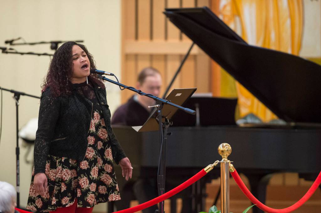 Salissa Thole sings at the Dr. Martin Luther King Jr. 2019 Community Celebration at St. Pauls Catholic Church on Monday, Jan. 21, 2019. (Michael Penn | Juneau Empire)