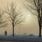 Kurt West takes a walk along Channel Drive as the sun rises on Tuesday, Jan. 15, 2019. (Michael Penn | Juneau Empire)