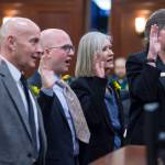Rep. Dan Ortiz, I-Ketchikan, left, Rep. Jonathan Kreiss-Tomkins, D-Sitka, Rep. Andi Story, D-Juneau, and Rep. Sara Hannan, D-Juneau, take the oath of office on the opening day of the 31st Session of the Alaska Legislature on Tuesday, Jan. 15, 2019. (Michael Penn | Juneau Empire)
