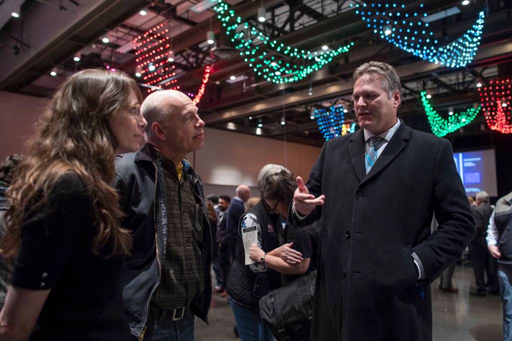 Irene Gallion and Eric Nelson meet with Gov. Michael J. Dunleavy at the 34th Annual Community Welcome Reception at Centennial Hall on Wednesday, Jan. 16, 2019. The reception is funded by donations from businesses, organizations and individuals. (Michael Penn | Juneau Empire)