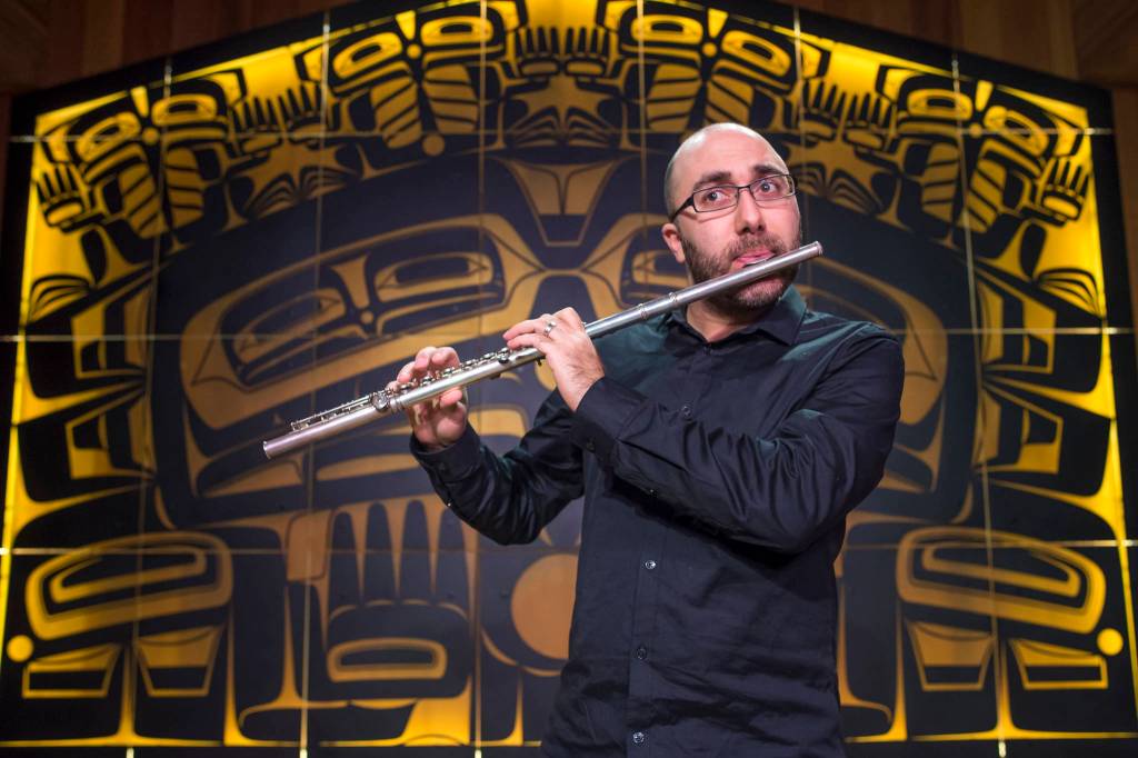 Armenian-American flutist Tigran Arakelyan, the Music Director of the Northwest Mahler Festival in Seattle and the Port Townsend Orchestra, performs a sound check in the Shuká Hít (Ancestors House) at the Walter Soboleff Center on Wednesday, Jan. 16, 2019. (Michael Penn | Juneau Empire)