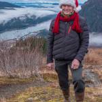 Dec. 9, 2018: On this gray December day, it sure didnt look much like winter. But that didnt stop Mark Miller from getting into the holiday spirit on a hike with friends above the tram. Mandatory wardrobe for the mountain was his insulated jacket from Spyder, pants from Slates, and hiking boots from Le Chameau. His fleece neck gaiter, crimson chenille scarf and Santas hat brought color to the day and made everyone smile.