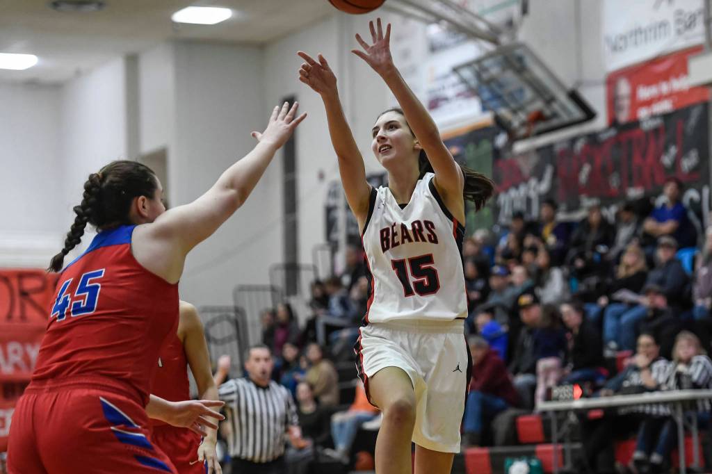 Juneau-Douglas Jenae Pusich, right, shoots over Sitkas Jessica Davis at JDHS on Friday, Jan. 25, 2019. Sitka won 37-31. (Michael Penn | Juneau Empire)