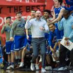 Thunder Mountains coach John Blasco, center, and his team react to their late game lead against Juneau-Douglas at JDHS on Friday, Jan. 25, 2019. Thunder Mountain won 67-63. (Michael Penn | Juneau Empire)