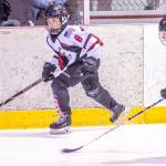 Juneaus Jaeger Dostal races down ice against Eagle Rivers Matthew Ross during a weekend game at Treadwell Arena. (Courtesy Photo | Steve Quinn)