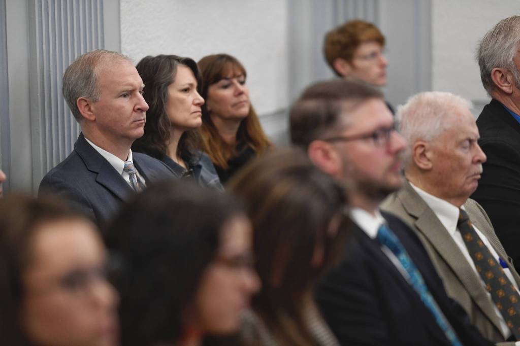 Brian Holst, president of the Juneau School Districts Board of Education, left, Kristin Bartlett, JSD Chief of Staff, center, and Bridget Weiss, JSD Superintendent, watch from the gallery as the Senate Finance Committee listens to a supplemental budget offered by Gov. Mike Dunleavys Office of Management and Budget Director Donna Arduin at the Capitol on Tuesday, Jan. 29, 2019. (Michael Penn | Juneau Empire)