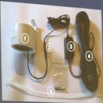 A photo of a PA-II Dual Laser Air Sensor was shared during a commission meeting Tuesday, Jan.29, 2019. The cylinder labeled 1 is a laser center, 2 is a micro USB connector, 3 is an outdoor power supply, 4 is a 17-foot-long length of cable and 5 are ties for securing the device. (Ben Hohenstatt | Juneau Empire)