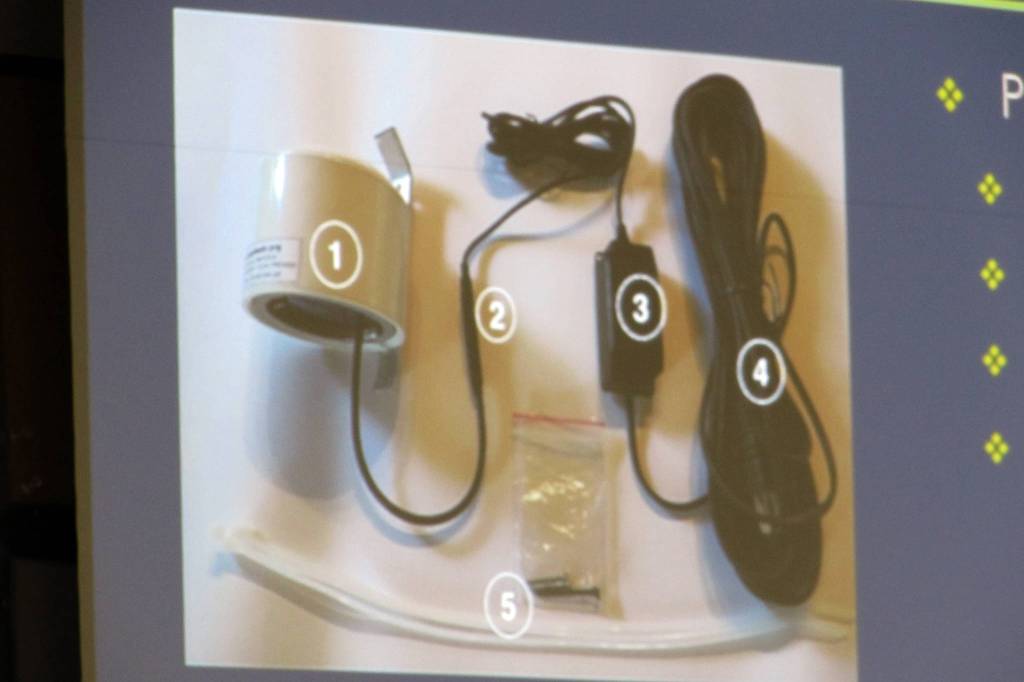 A photo of a PA-II Dual Laser Air Sensor was shared during a commission meeting Tuesday, Jan.29, 2019. The cylinder labeled 1 is a laser center, 2 is a micro USB connector, 3 is an outdoor power supply, 4 is a 17-foot-long length of cable and 5 are ties for securing the device. (Ben Hohenstatt | Juneau Empire)