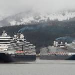 The Holland America Line cruise ships Eurodam, left, and Nieuw Amsterdam pull into Juneaus downtown harbor on May 1, 2017. (Michael Penn | Juneau Empire)