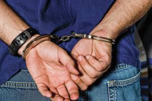 Man arrested after assaulting woman, officers