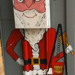 Santa covers an outdoor utility box just outside the doors to Pie in the Sky in downtown Juneau. (Courtesy Photo | Denise Carroll)