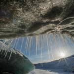 Icicles hang from the front of the Mendenhall Glacier on Monday, Feb. 5, 2018. (Michael Penn | Juneau Empire File)