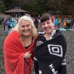Juneau residents take to the frigid waters at Auke Bay Recreation Area for the annual Juneau Polar Bear Dip on Tuesday, Jan. 1, 2019. Nearly 200 people took the plunge to start off the new year. (Michael Penn | Juneau Empire)