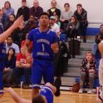 Thunder Mountain teammates Stone Morgan, left; Brady Carandang and Vaipuna Toutaiolepo (down) position themselves for a rebound against Monroe Catholics Mason Muramoto, right, during Mt. McKinley Bank Holiday Classic at Monroe Catholic High School on Thursday, Jan. 3, 2019. (Danny Martin | Fairbanks Daily News Miner)
