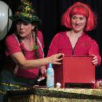 Elves Lisa Morley and Alysia Jones react to the news that they must always be tinkering during the Christmas extravaganza at the Gold Town Theater Saturday, Jan. 5, 2019. (Ben Hohenstatt | Capital City Weekly)