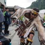 Morgan Fawcett of Woosh.ji.een of Juneau dances in the Grand Entrance for Celebration 2018 along Willoughby Avenue on Wednesday, June 6, 2018. (Michael Penn | Juneau Empire)