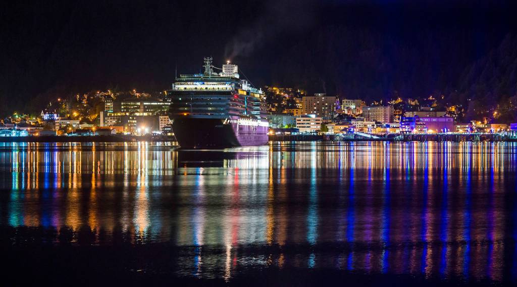 The Holland America Line cruise ship Westerdam slips out of Juneaus downtown harbor just before 11 p.m. on Tuesday, Oct. 2, 2018. The Norwegian Pearl also visited Tuesday, the last day of the season. (Michael Penn | Juneau Empire)