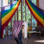 Maisi MacCabe exits a voting booth at Aldersgate United Methodist Church on Election Day, Tuesday, Nov. 6, 2018. (Michael Penn | Juneau Empire)