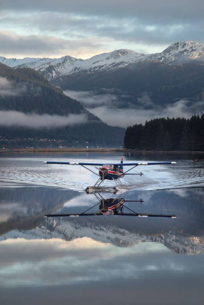 A Ward Air floatplane motors across the floatplane pond at the Juneau International Airport on Tuesday, Nov. 27, 2018. (Michael Penn | Juneau Empire)