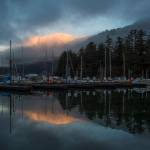 Mount Juneau catches the first rays of sunrise as seen from the Mike Pusich Douglas Boat Harbor on Thursday, Jan. 3, 2019. (Michael Penn | Juneau Empire)