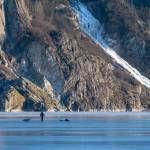 Biker Bob Funk is pictured after falling through the ice of Mendenhall Lake on Sunday. His grandson is pictured on the ice nearby. (Courtesy Photo | Carol Lahnum)