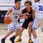 Thunder Mountain High Schools Kamron Falls dribbles around a screen by Meki Toutaiolepo in their game against Cleveland High School, of Seattle, in the Tournament of Champions in Seattle on Thursday Dec. 27, 2018. (Courtesy Photo | Patrick Krohn Photography)