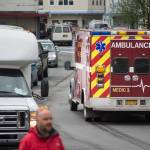 A Capital City Fire/Rescue crew transports a cruise ship passenger downtown on Tuesday, August 14, 2018. (Michael Penn | Juneau Empire)
