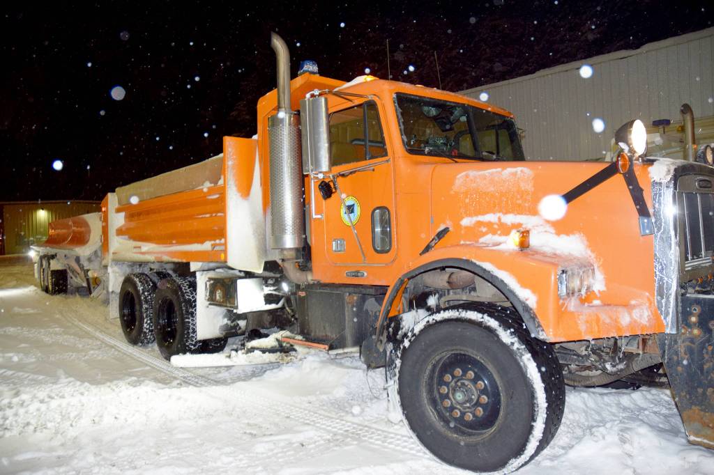 The Department of Transportation and Public Facilities tow plow sits in a parking lot between shifts on Thursday Jan. 10. (Mollie Barnes | Juneau Empire)