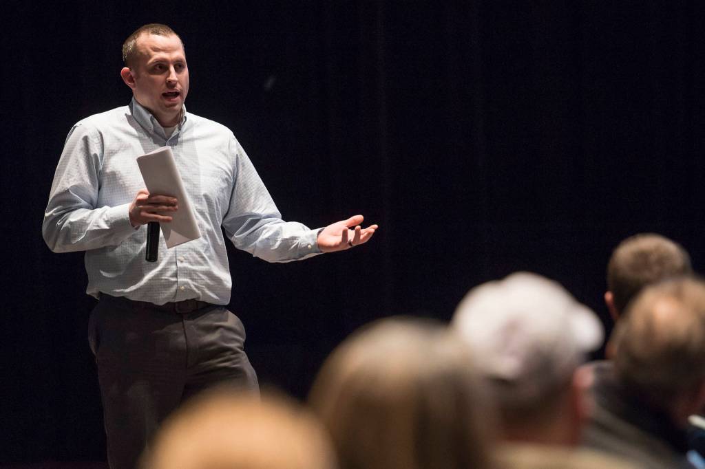 Juneau Police Department Sgt. Sterling Salisbury gives a presentation during an open house on crime in Juneau at Centennial Hall on Thursday, Jan. 10, 2019. The meeting was organized by members of the Public Safety Employees Association. (Michael Penn | Juneau Empire)