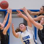 Thunder Mountains Nina Fenumiai is out-rebounded by Colonys Hannah Duguid, left, Indiya Clarke, top, and Vivian Sonnenber at TMHS on Friday, Jan. 11, 2019. Colony won 58-28. (Michael Penn | Juneau Empire)